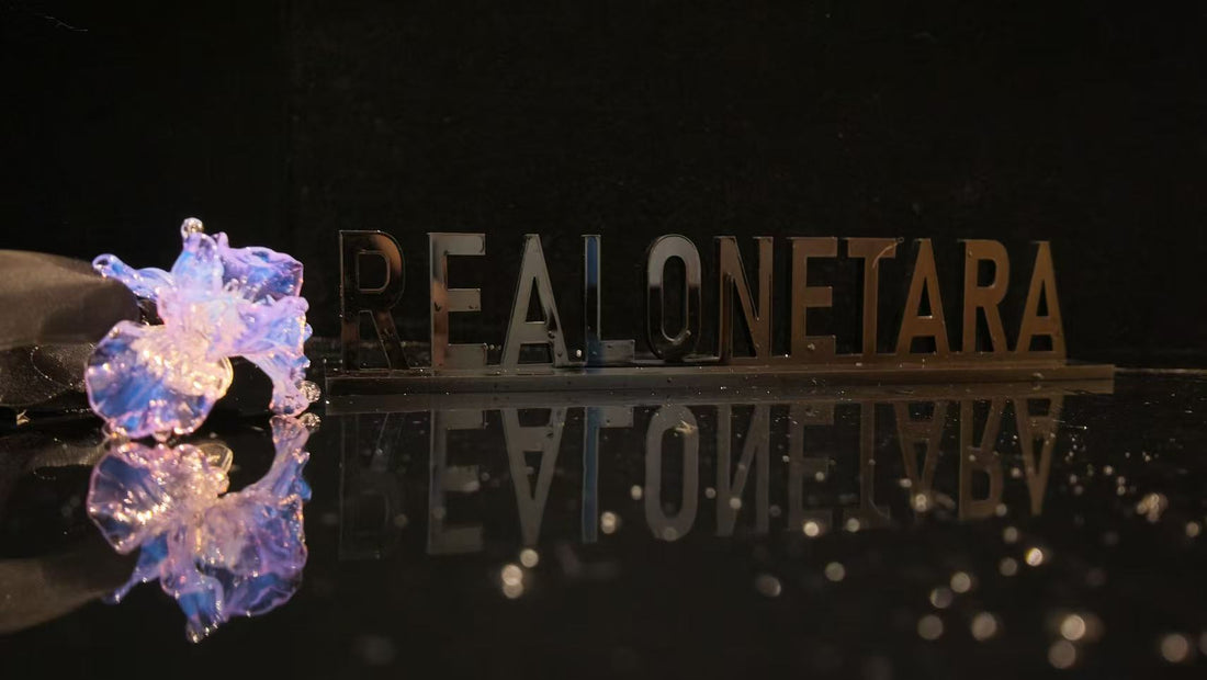 Liuli flower jewelry piece with REALONETARA branding, showcasing the art of hand-poured colored Liuli