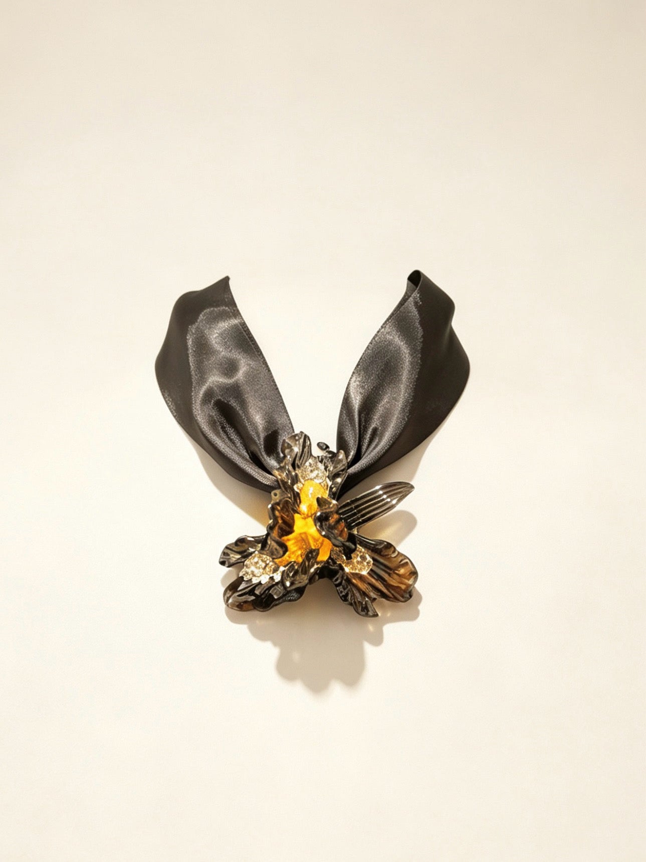 Handcrafted black gold Liuli glass iris choker necklace on white background, black organza ribbon chain with lobster clasp