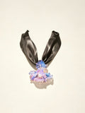 Handcrafted purple Liuli glass iris choker necklace on white background, black organza ribbon chain with lobster clasp
