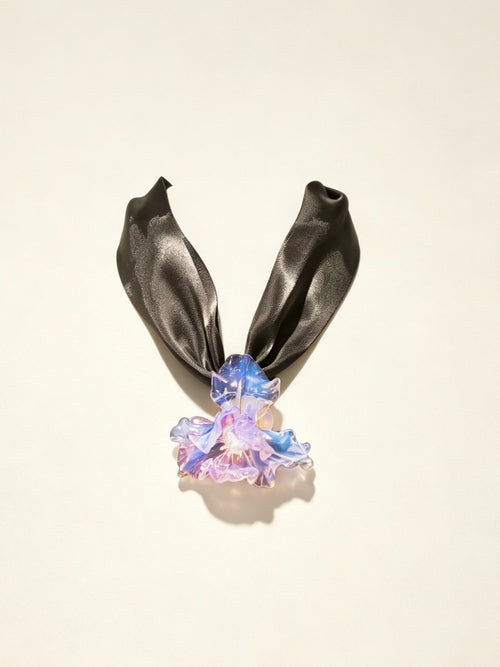 Handcrafted purple Liuli glass iris choker necklace on white background, black organza ribbon chain with lobster clasp