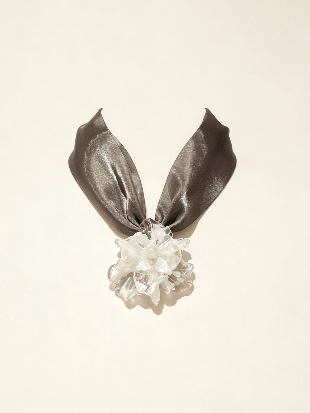 Handcrafted white Liuli glass iris choker necklace on white background, black organza ribbon chain with lobster clasp