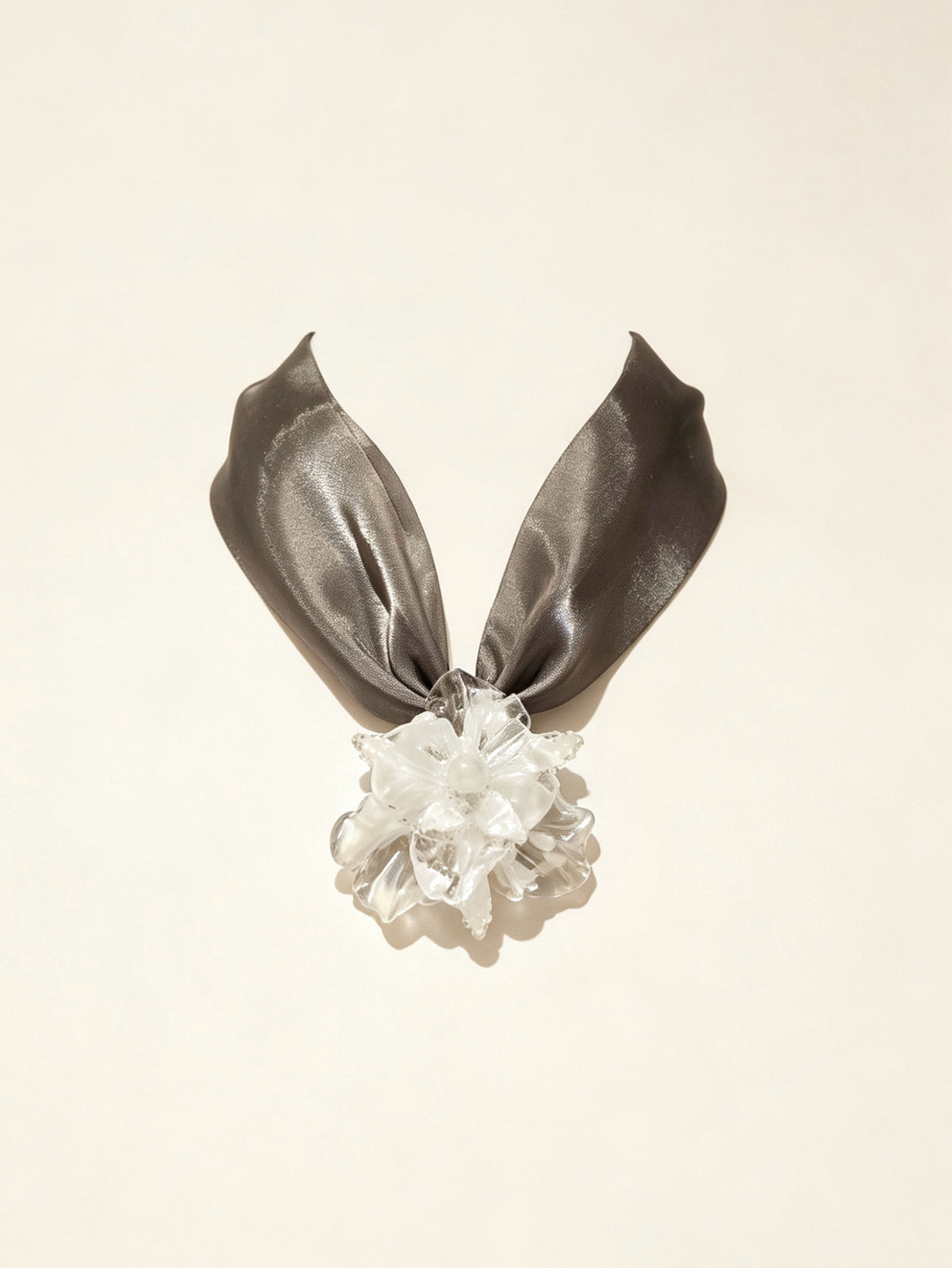 Handcrafted white Liuli glass iris choker necklace on white background, black organza ribbon chain with lobster clasp