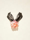 Handcrafted pink gold Liuli glass rose choker necklace on white background, black organza ribbon chain with lobster clasp