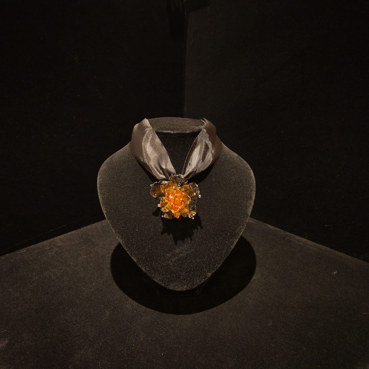 REALONETARA Noble Lady Green Gold Rose Flower Liuli necklace displayed on a black jewelry bust.