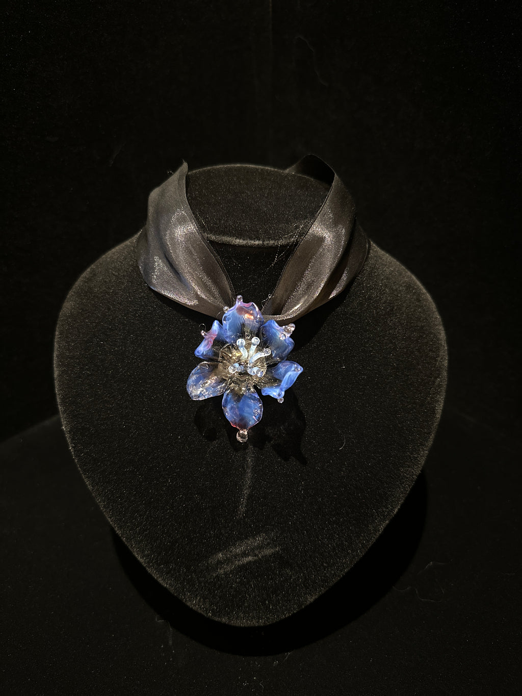 REALONETARA Queen Purple Blue Orchid Flower Liuli necklace displayed on a black jewelry bust.